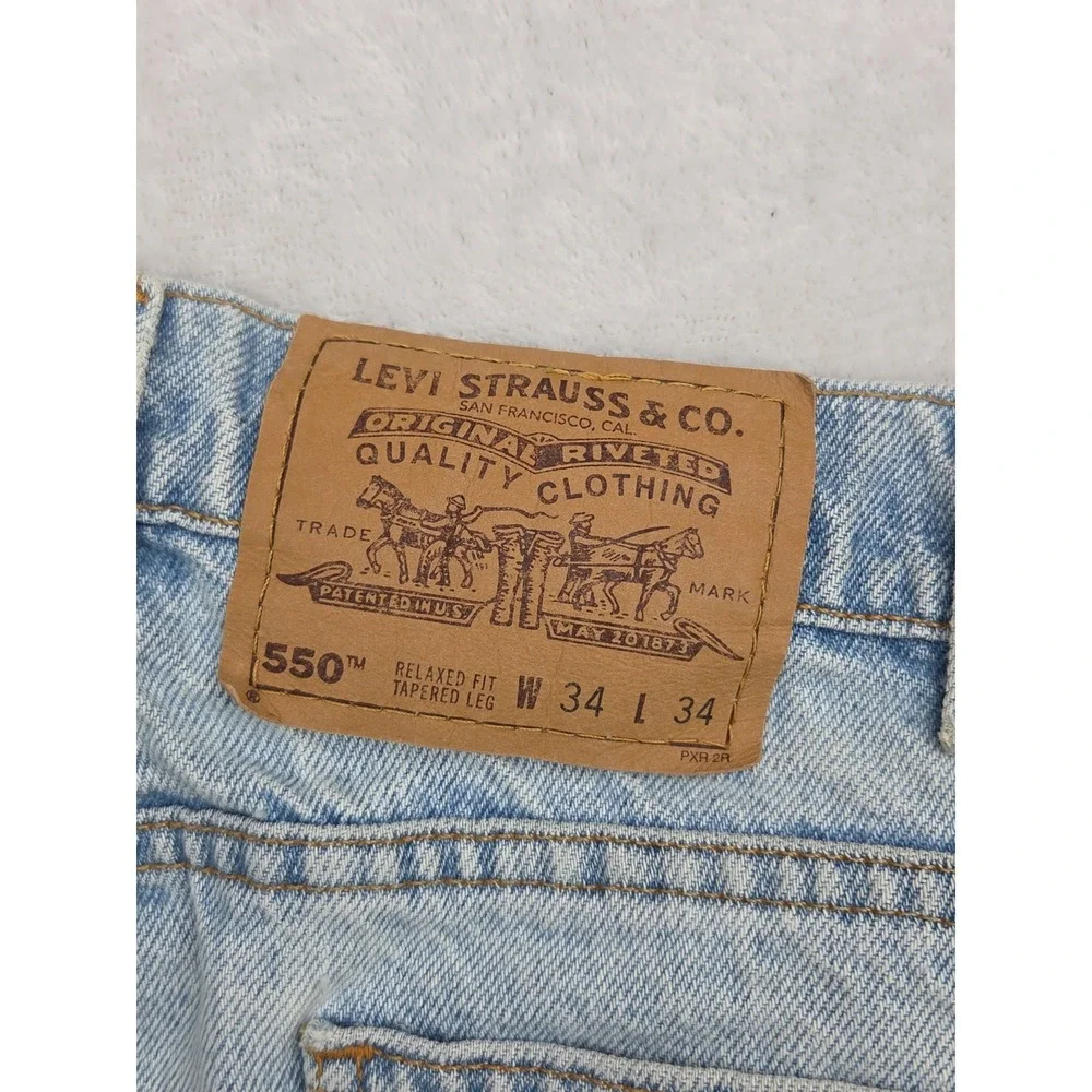 Vintage 90s Levi's 550 Jeans‎ | Orange Tab Light Wash | Relaxed Tapered | 34x34